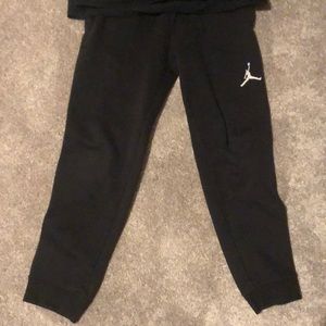 Jordan sweatpants with a Nike short sleeve shirt